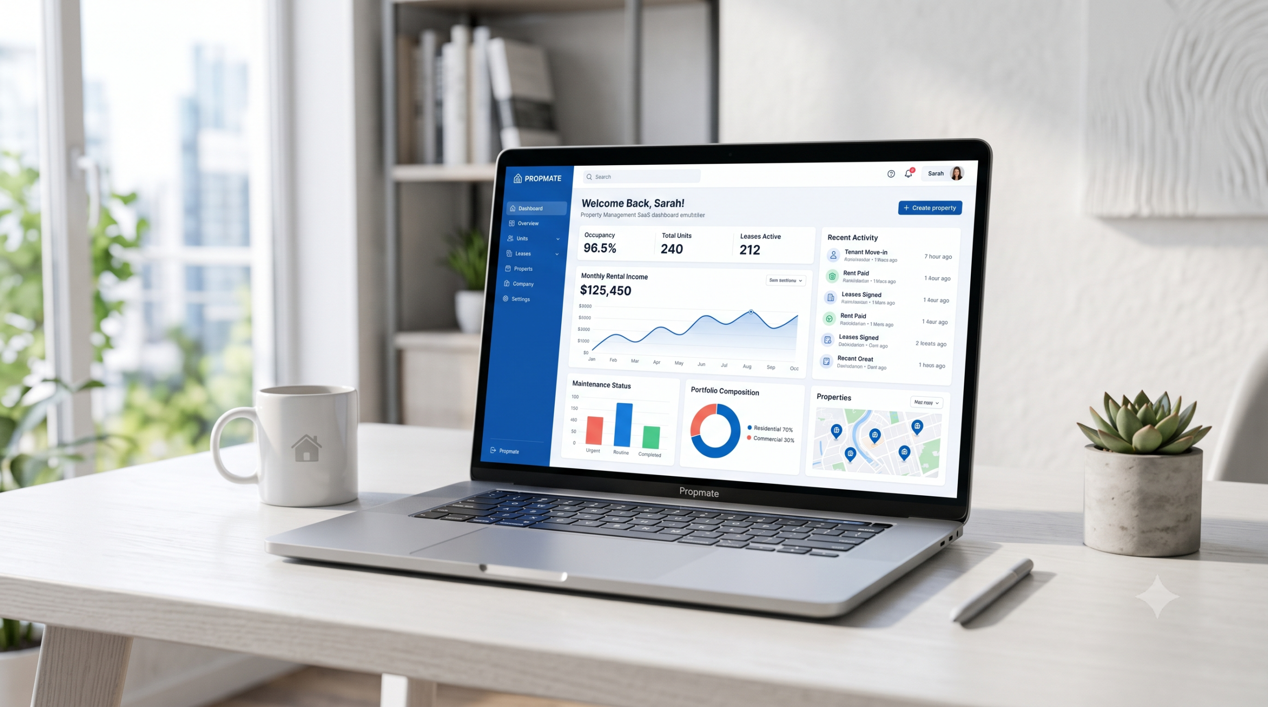 Cloud-based property management software dashboard displaying real estate analytics on a laptop screen